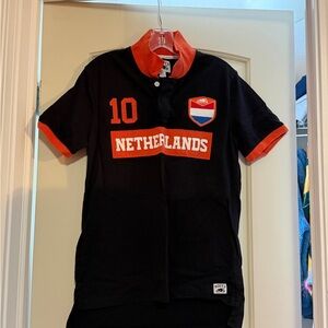 Roots Kids Netherlands Polo Shirt - Black and Orange